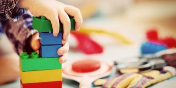 a toddler playing in one of the Sunshine Coast child development centres today
